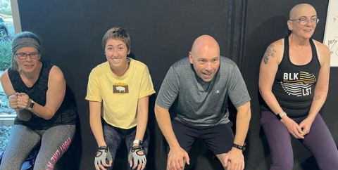 Evoke Warriors doing wall sits