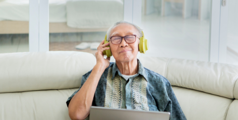 man listening to podcast