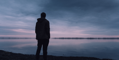 man standing on a beach