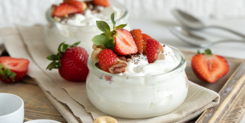 bowl of yogurt with strawberries